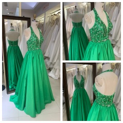 2026 Luxury Satin Green Floor-Length Sweep Train Spaghetti Strap Prom Dresses Backless Halter with Sequined Appliques
