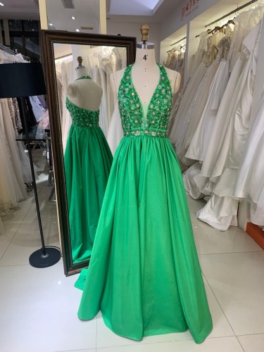 2026 Luxury Satin Green Floor-Length Sweep Train Spaghetti Strap Prom Dresses Backless Halter with Sequined Appliques