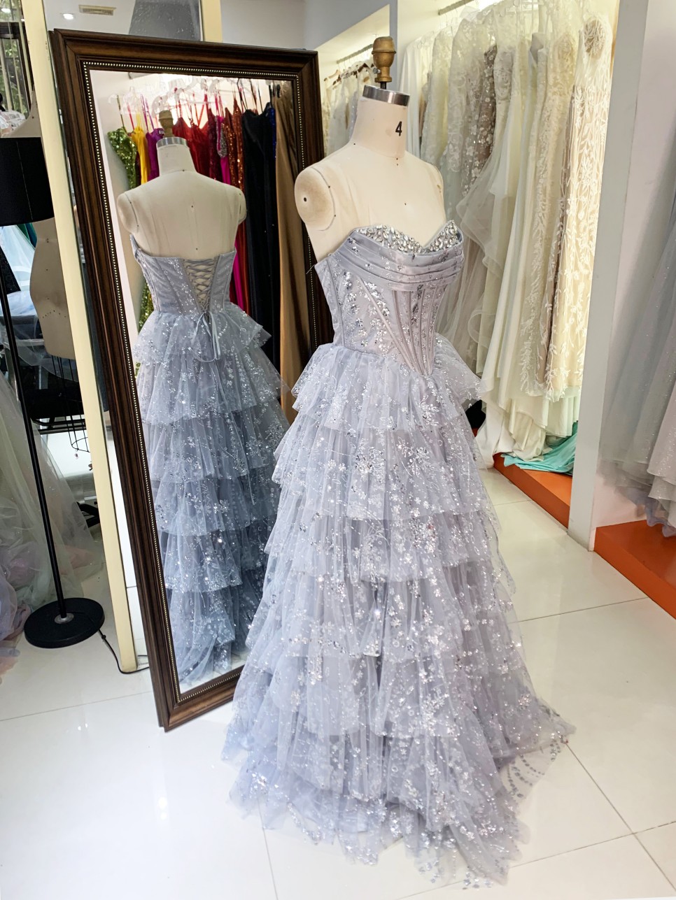 Dusty Blue Wholesale Prom Dresses 2026 2027 Evening Dress Factory Strapless Rhinestone Corset Tiered Ruffle Ball Gown Supplier