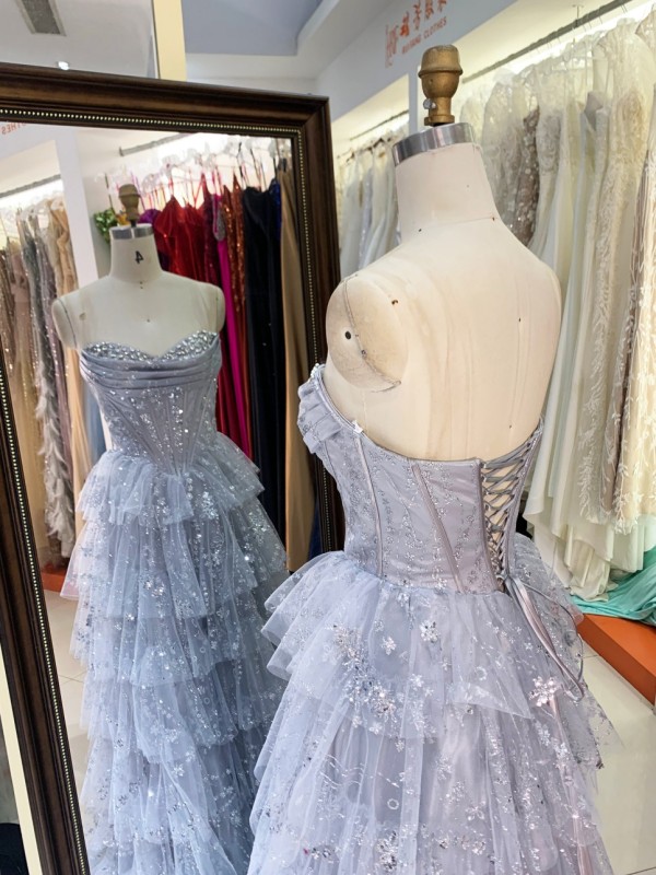 Dusty Blue Wholesale Prom Dresses 2026 2027 Evening Dress Factory Strapless Rhinestone Corset Tiered Ruffle Ball Gown Supplier