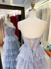 Dusty Blue Wholesale Prom Dresses 2026 2027 Evening Dress Factory Strapless Rhinestone Corset Tiered Ruffle Ball Gown Supplier