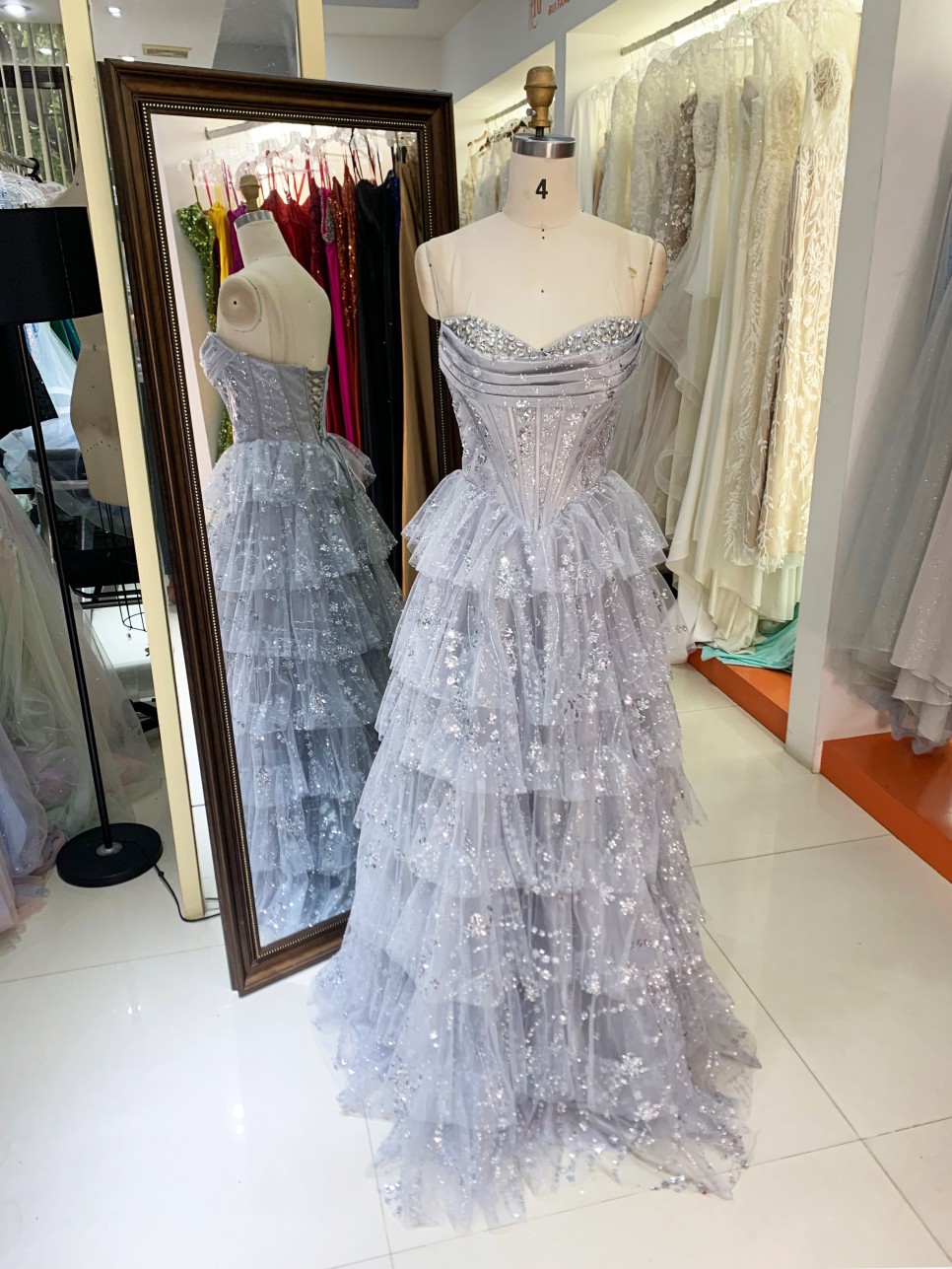 Dusty Blue Wholesale Prom Dresses 2026 2027 Evening Dress Factory Strapless Rhinestone Corset Tiered Ruffle Ball Gown Supplier