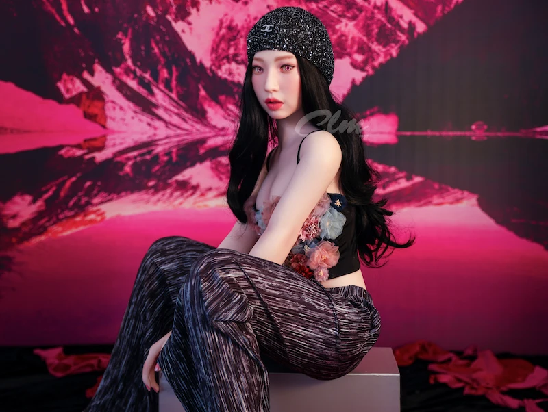 Full-size-sex-doll-Janice-sitting-on-stool-side-view