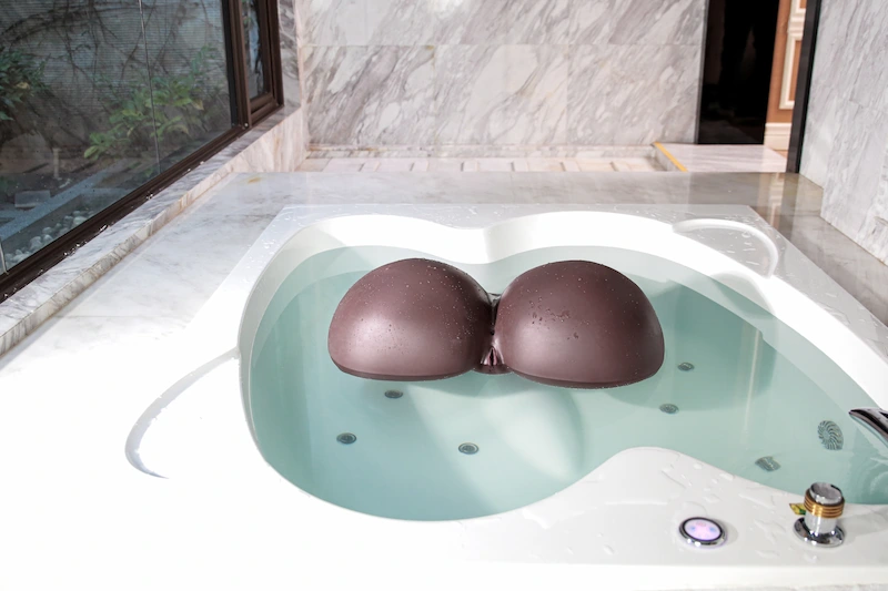 Unique-sex-torso-toy-floating-on-bathtub-R3-Cocoa