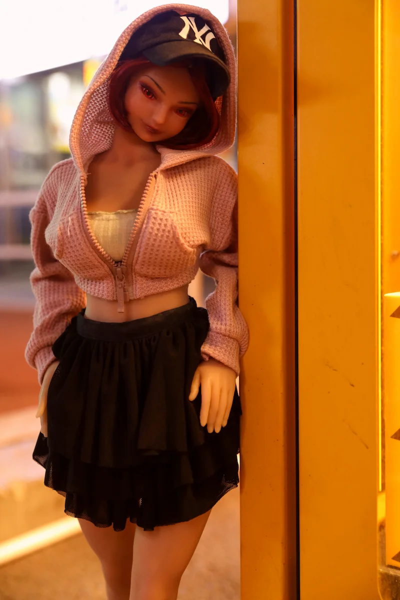 Silicone-mini-sex-doll-si60cm-l-masami-leaning-on-door