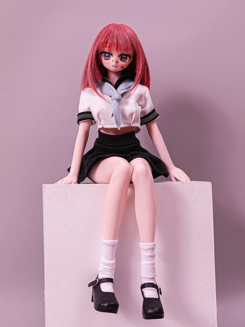 Best-mini-sex-doll-sitting-on-platform-J60cm-Zapata