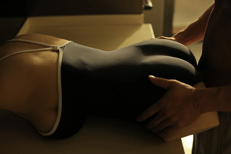 Half-sex-torso-toy-planar-thigh-cinnamon-lying-on-counter