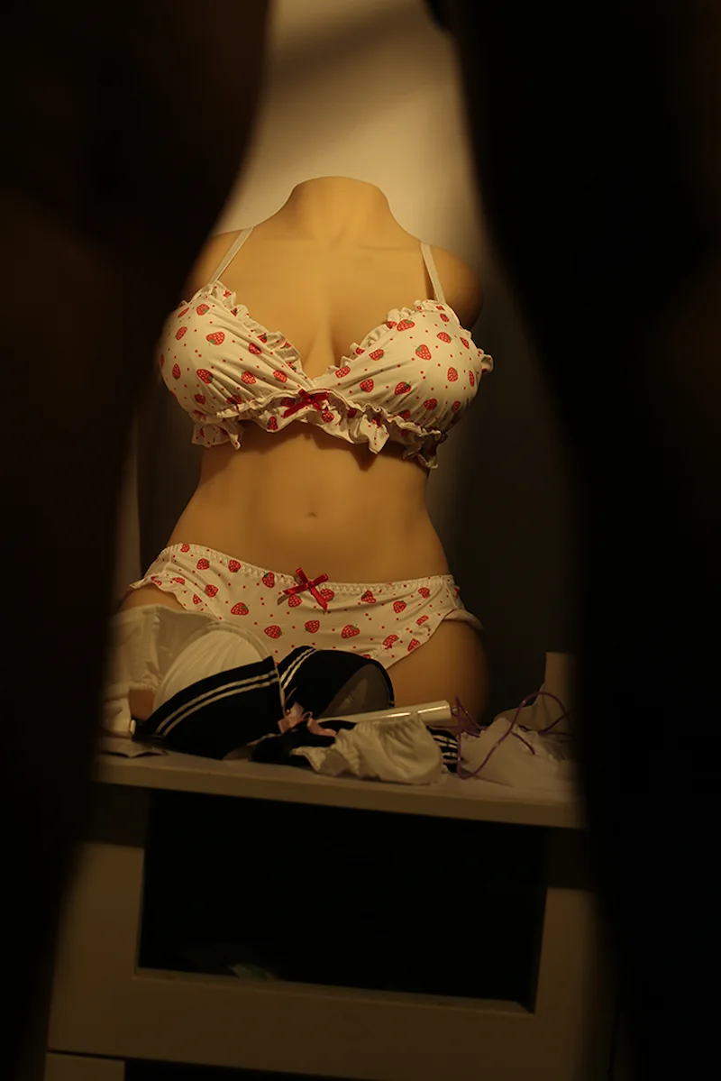 Life-size-sex-torso-Round-Thigh-Cinnamon-standing-in-closet