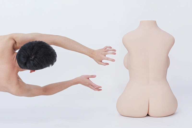 Realistic-torso-toy-round-thigh-yellow-back-close-up