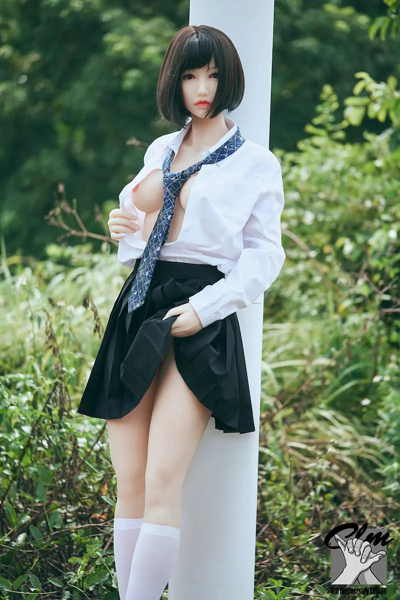Lifelike-sex-doll-ad15892y-fukada-uniform-leaning-against-utility-pole-display