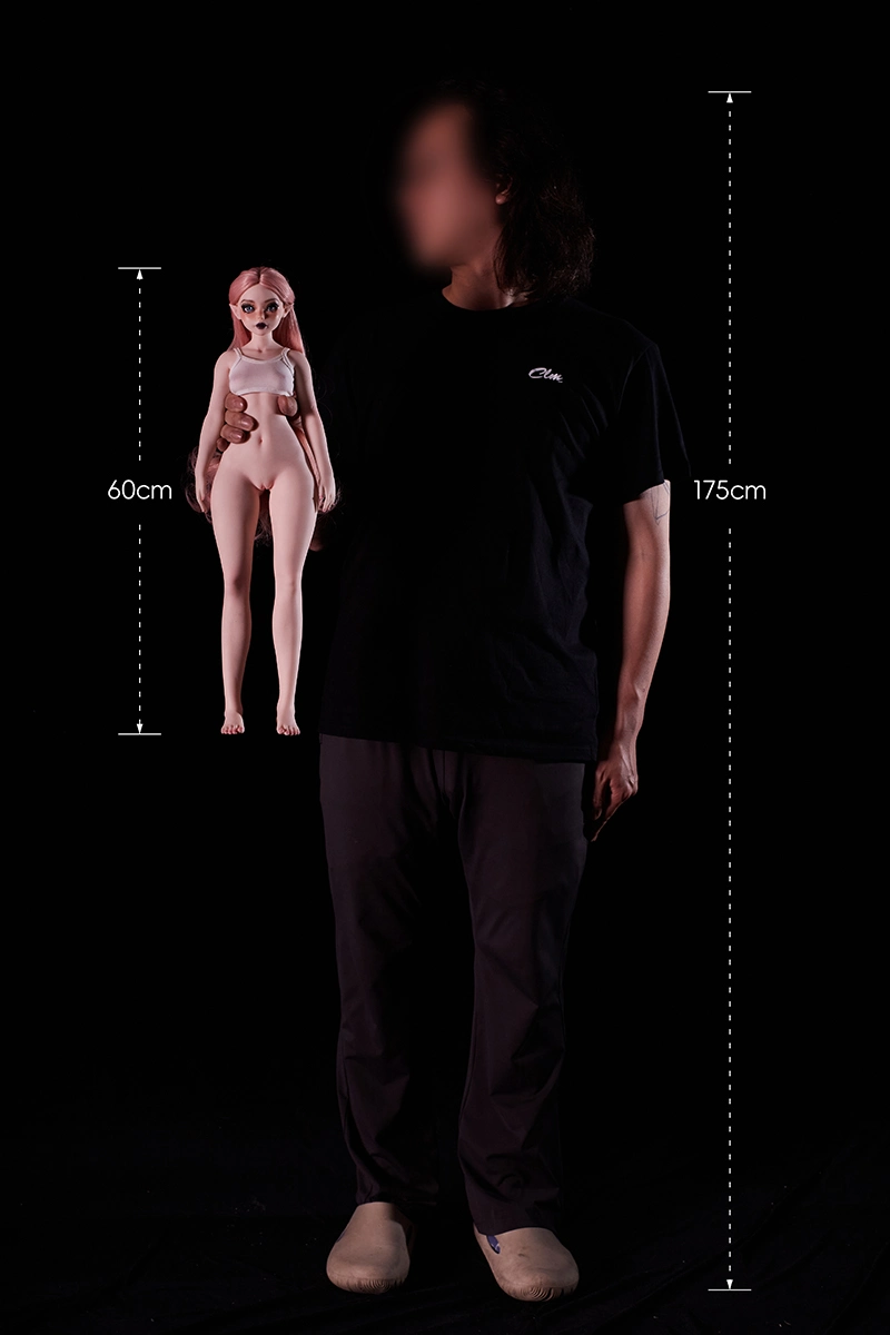 Designer-holding-silicone-mini-sex-doll-Hilary-for-front-view-display