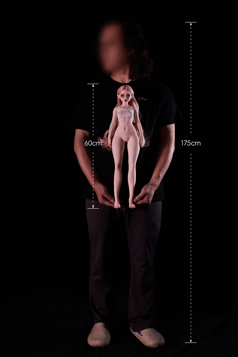 Frontal-demonstration-of-Hilary-mini-silicone-doll-held-in-designers-hands