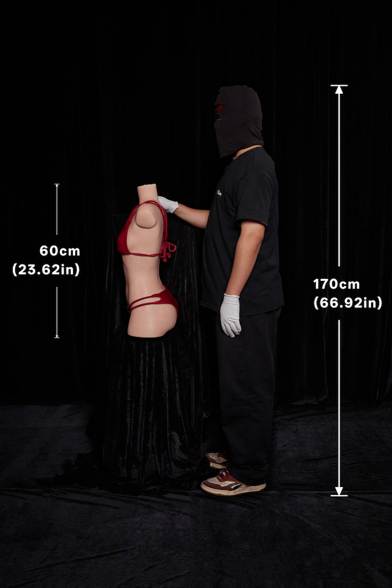 Rear view of the 60cm doll, featuring a slender waist and intricate red strapped lingerie details.