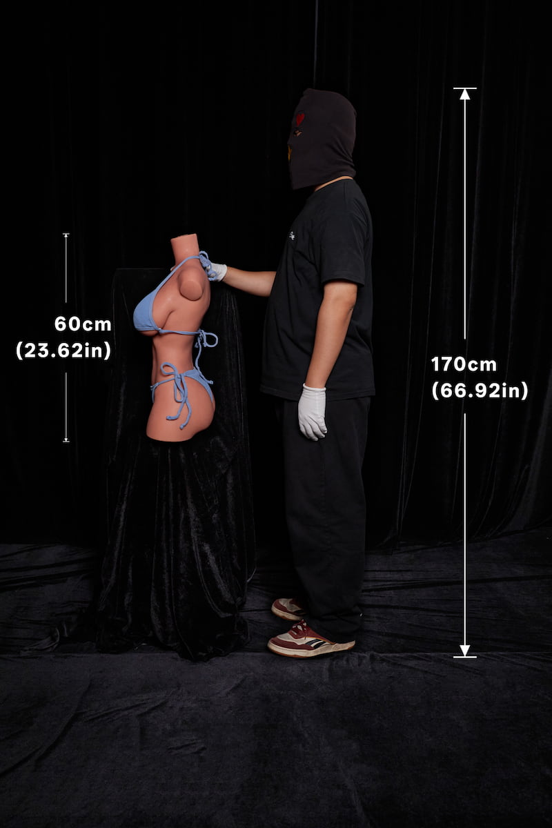 ULW662#Hedia: A side-view size comparison showing the 60cm headless half-body doll next to a 170cm adult male, clearly illustrating the product's depth, curves, and height proportion in a real-world setting.