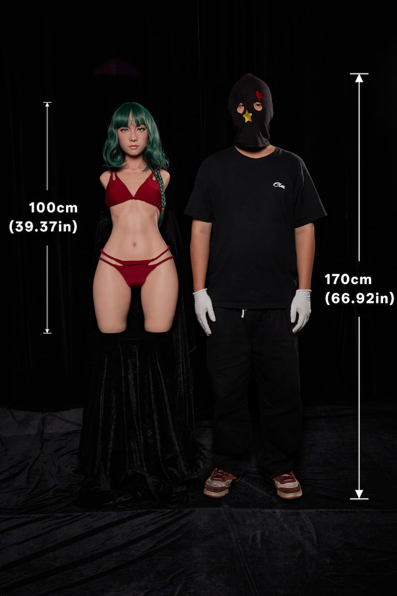 ULW 881# Mayu: This front-view full-body image showcases a size comparison between the doll and a 170cm tall person, featuring the doll with dark green wavy hair in a red bikini, with her height marked at 100cm to visually demonstrate her petite body proportions.
