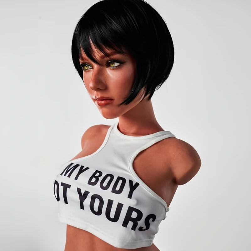 ULW 882# Livia: This half-body close-up features a detailed short-haired head sculpture wearing a captioned white crop top, highlighting its striking facial features, voluminous firm bust, and healthy skin accented with realistic freckles.