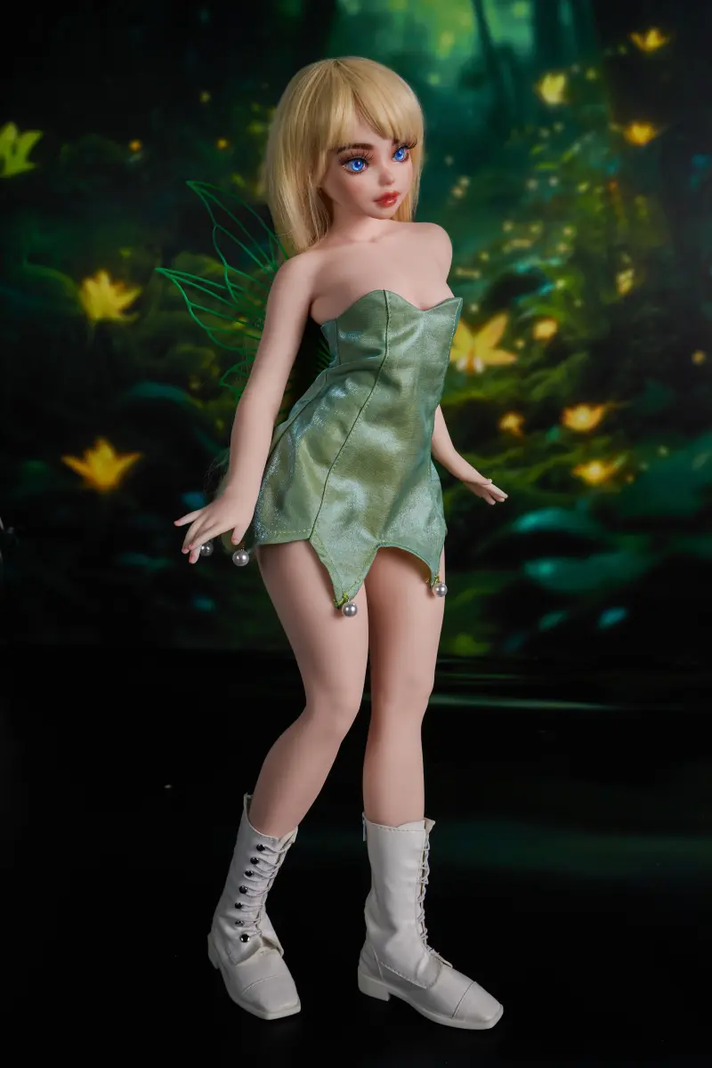Mini Fairy Fantasy Sex Doll Holly – Cinnamon Skin 3/4 Side View in Green Fairy Dress with Bent Knee Pose | CLM Classic