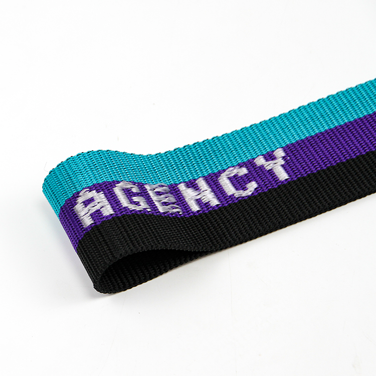 厂家批发4.5-5cm彩色PP提花带 间色字母织带 行李背包手提带肩带