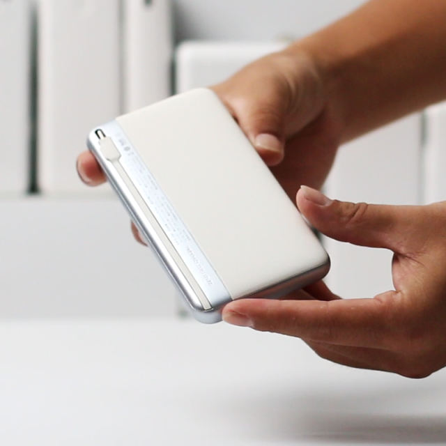 PD20W fast Charging Come with Type-C/Lighting Cable Power Bank(The appearance of the Huawei Mate 60) RC-PD49