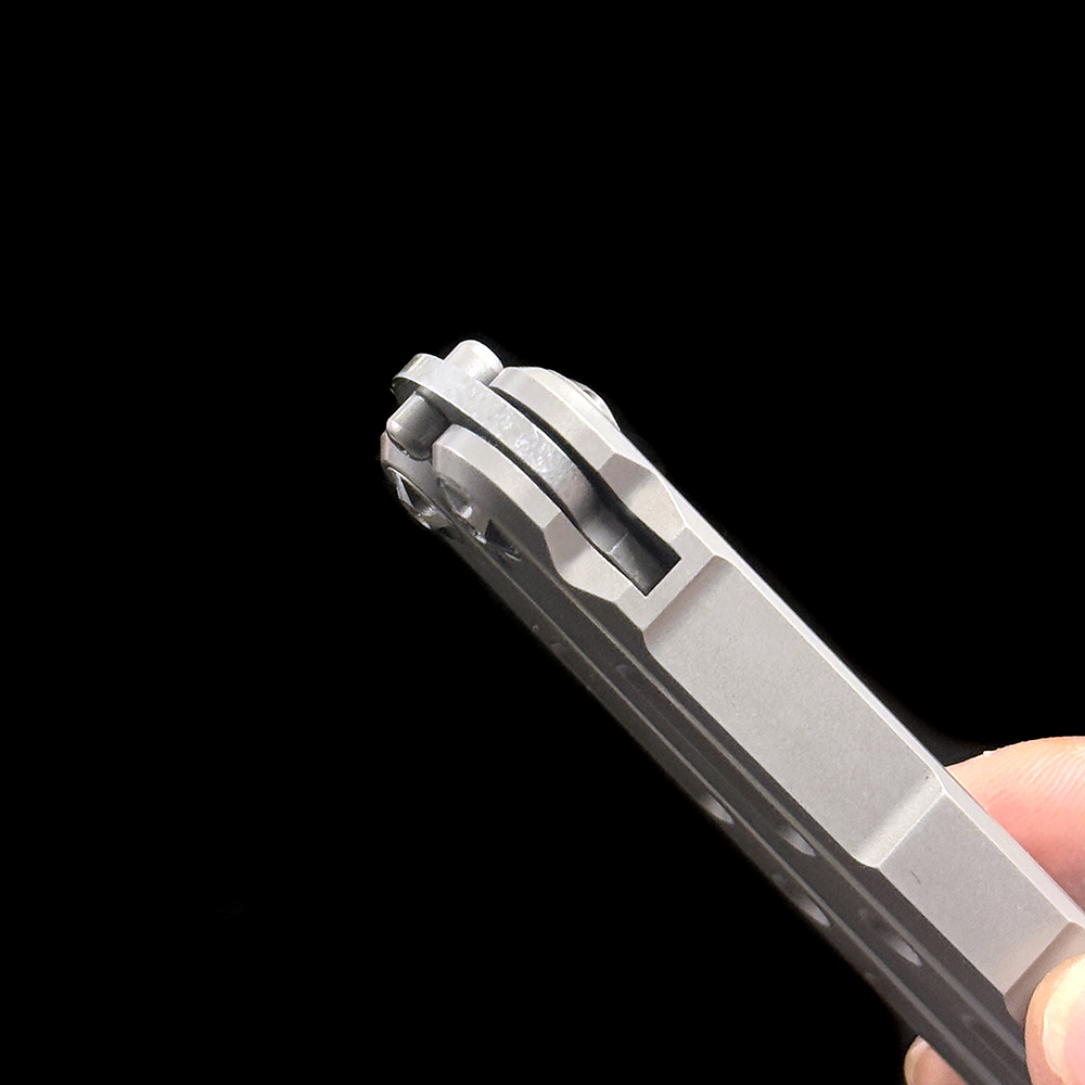 BM85 Titanium integrated handle Bali-Song Swing knife