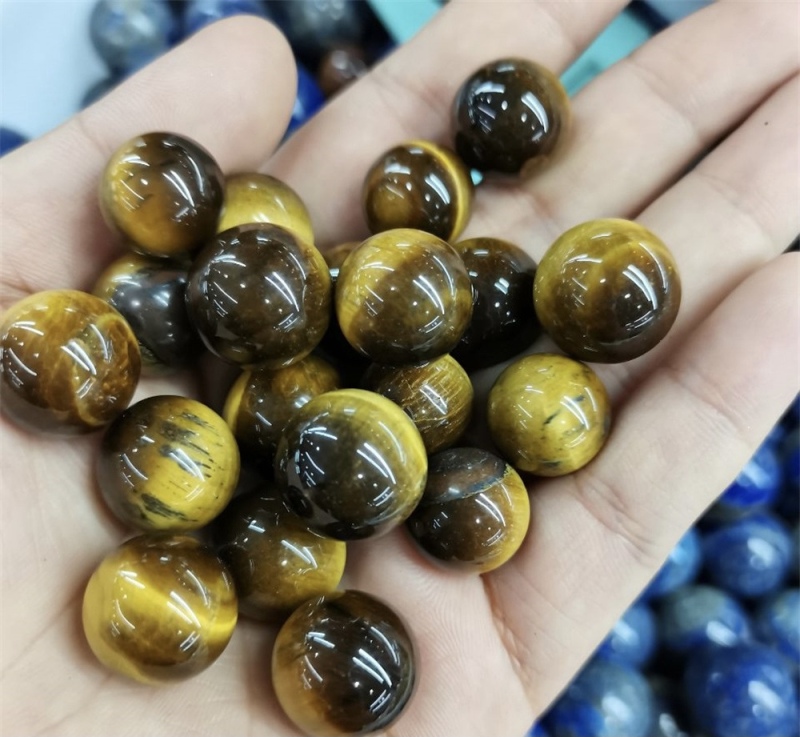 Outer single hot selling natural crystal tiger eye stone non-porous energy sphere astrolabe energy stone home decoration ornaments