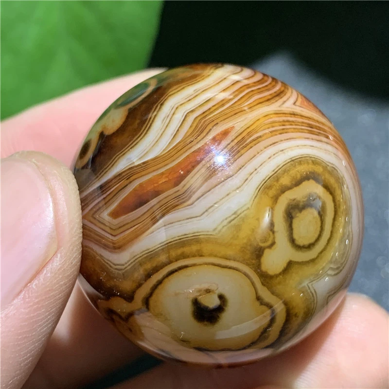 Outer single hot selling natural silk agate sphere rough polished sphere round non-porous energy stone home decoration