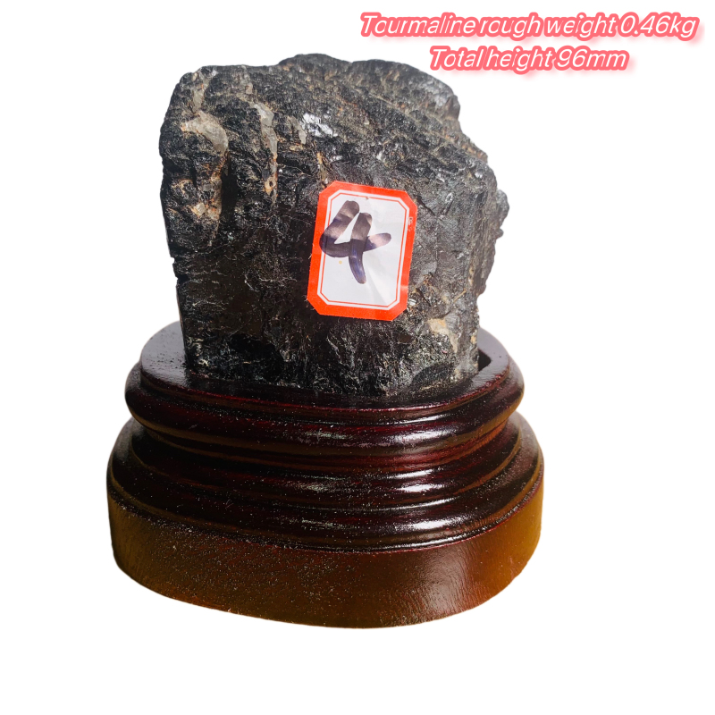 Black tourmaline rough stone ornament with wooden base