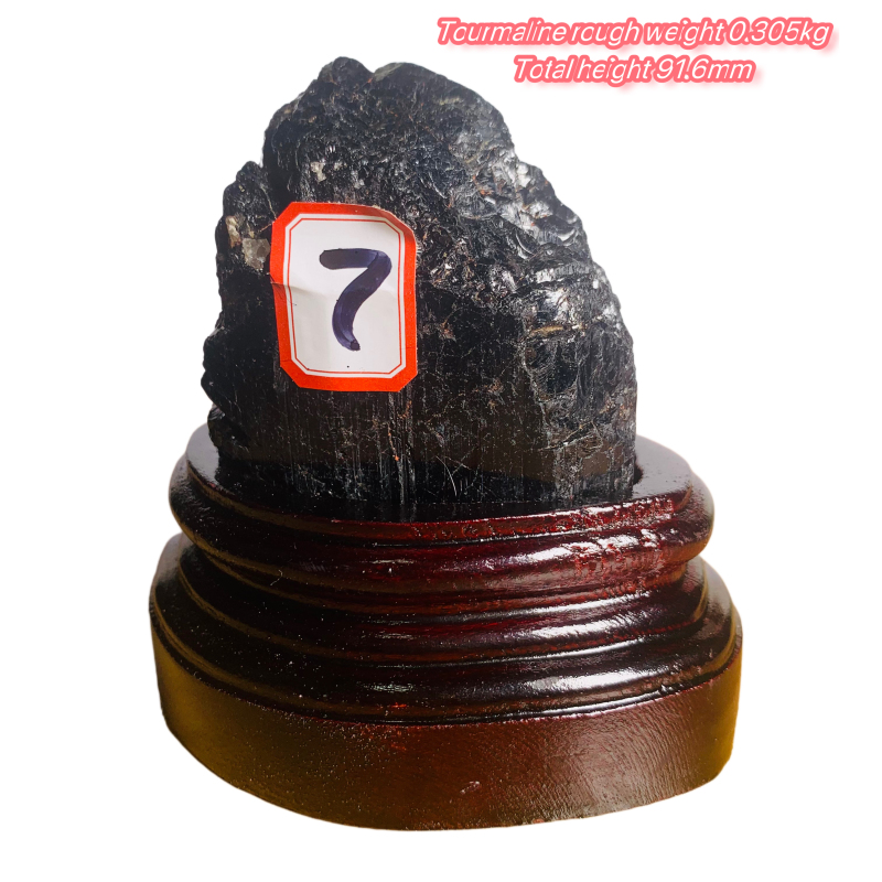 Black tourmaline rough stone ornament with wooden base