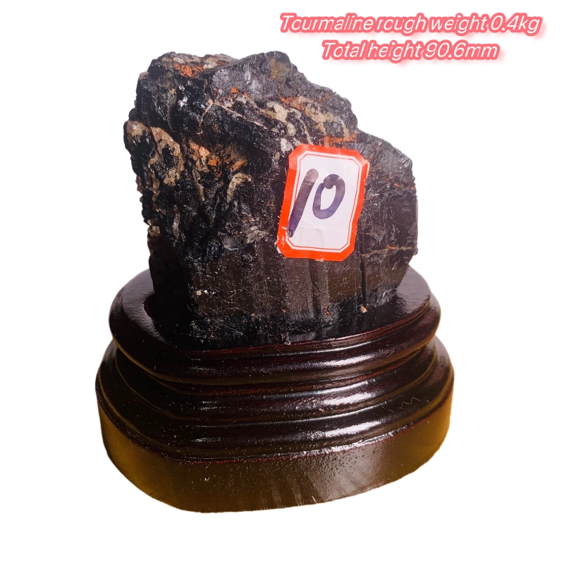 Black tourmaline rough stone ornament with wooden base