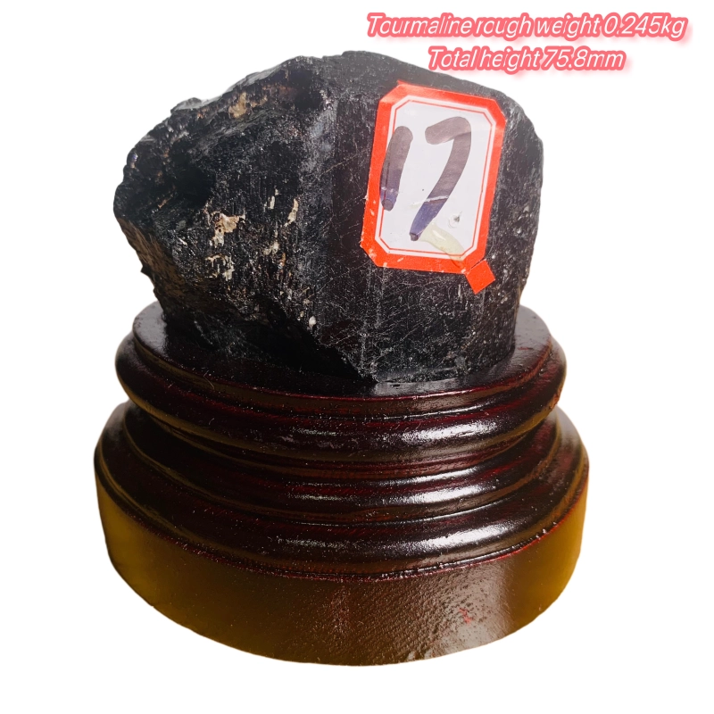 Black tourmaline rough stone ornament with wooden base