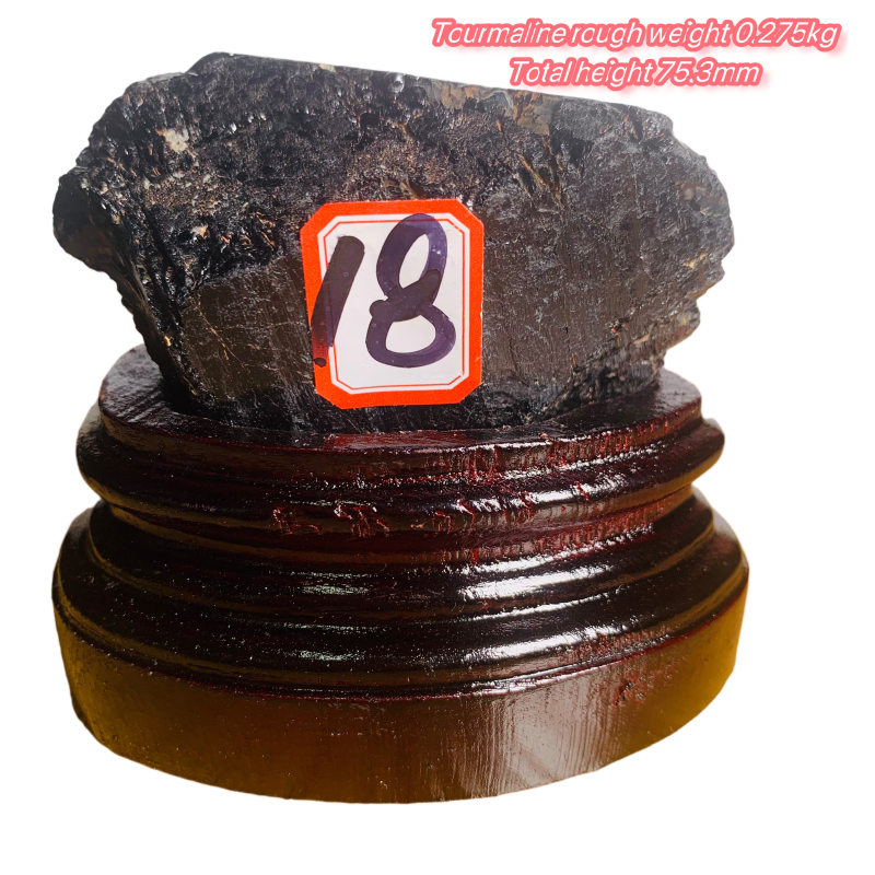 Black tourmaline rough stone ornament with wooden base