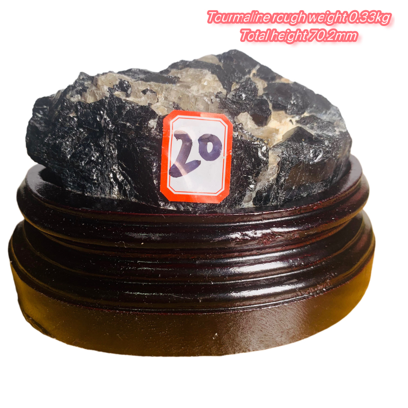 Black tourmaline rough stone ornament with wooden base