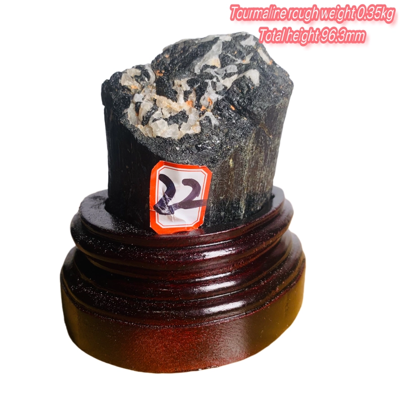 Black tourmaline rough stone ornament with wooden base