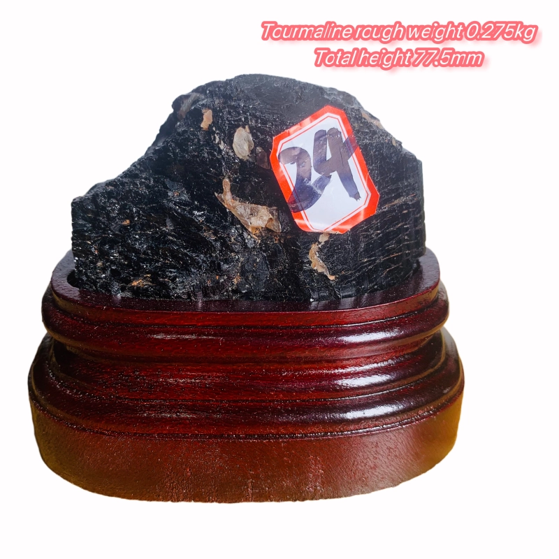 Black tourmaline rough stone ornament with wooden base