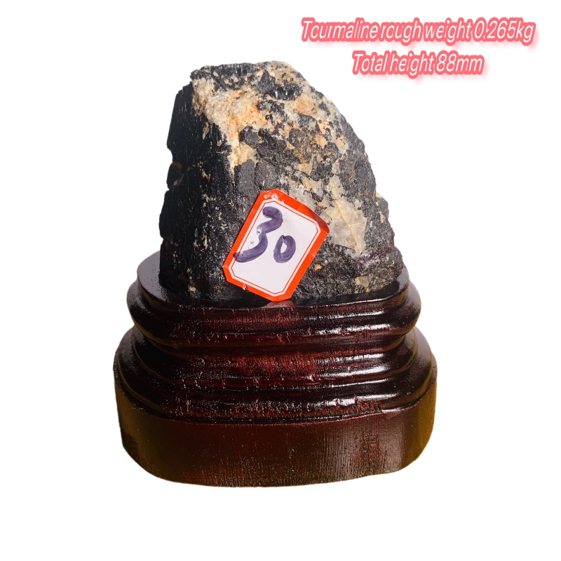 Black tourmaline rough stone ornament with wooden base