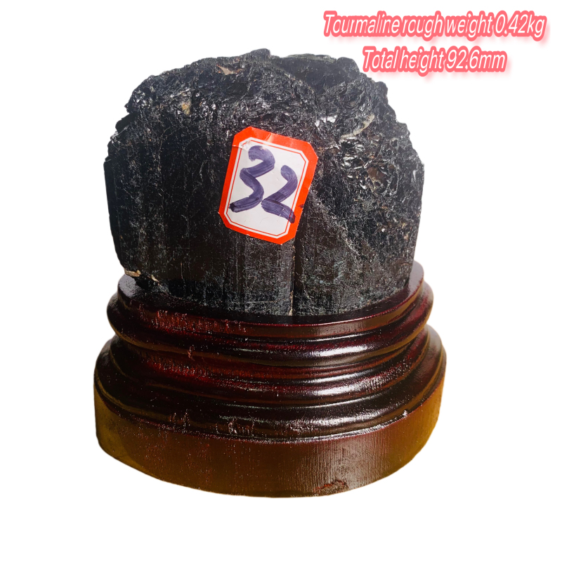 Black tourmaline rough stone ornament with wooden base