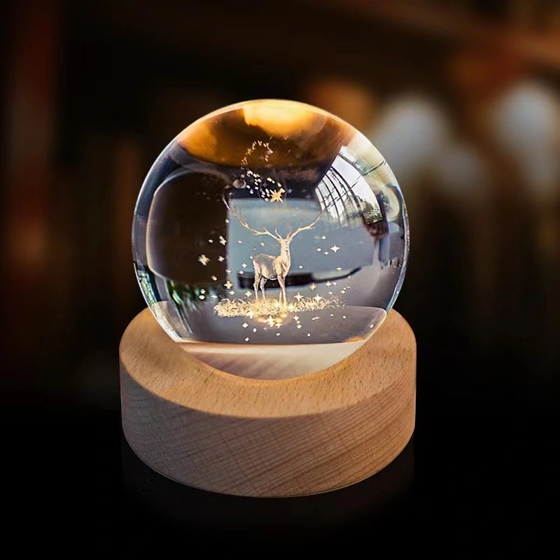 The latest crystal sphere cosmic galaxy series night light solid wood base luminous crystal small ornament 3D inner engraved glass