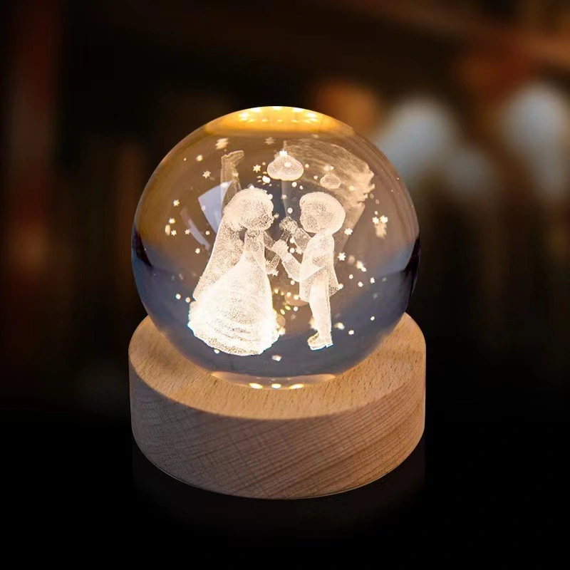 The latest crystal sphere cosmic galaxy series night light solid wood base luminous crystal small ornament 3D inner engraved glass