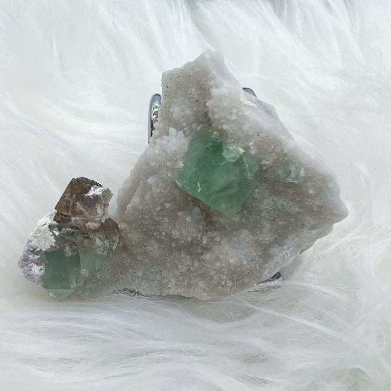Cubic Fluorite  on baby candle Quartz