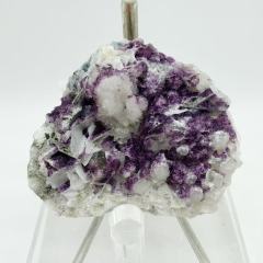 purple fluorite  on candle quartz