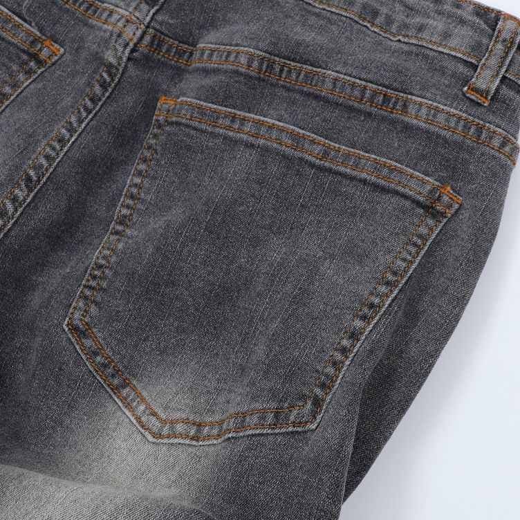 Pleated ripped jeans