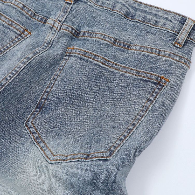 Pleated ripped jeans