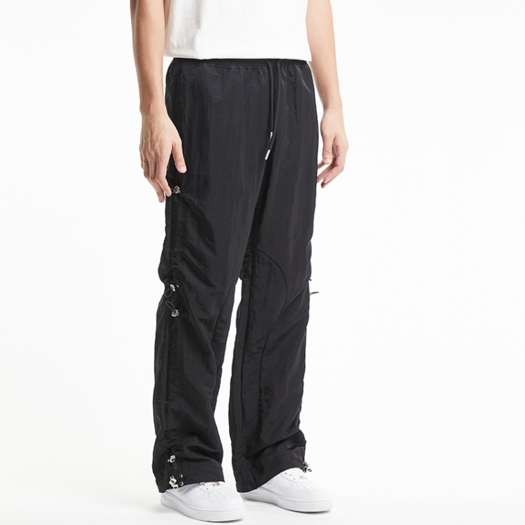 Black multi-shrink side strap pants