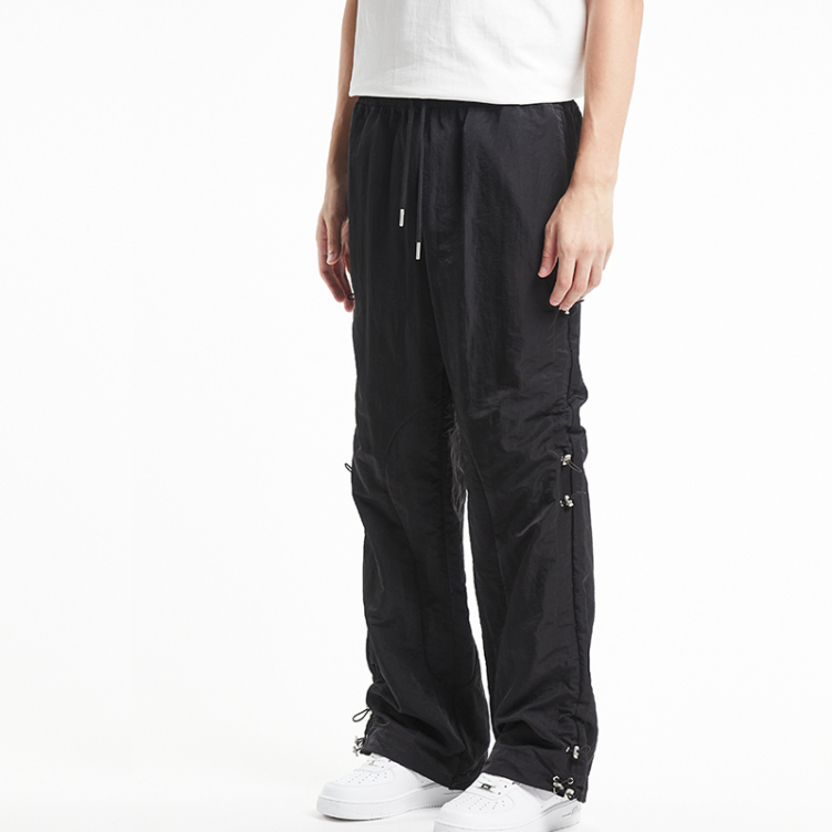 Black multi-shrink side strap pants