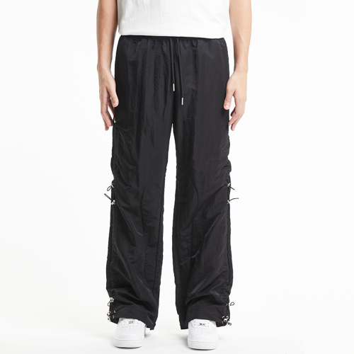 Black multi-shrink side strap pants