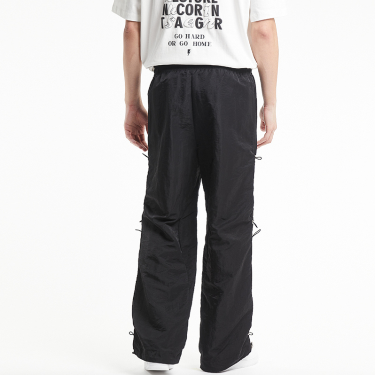 Black multi-shrink side strap pants