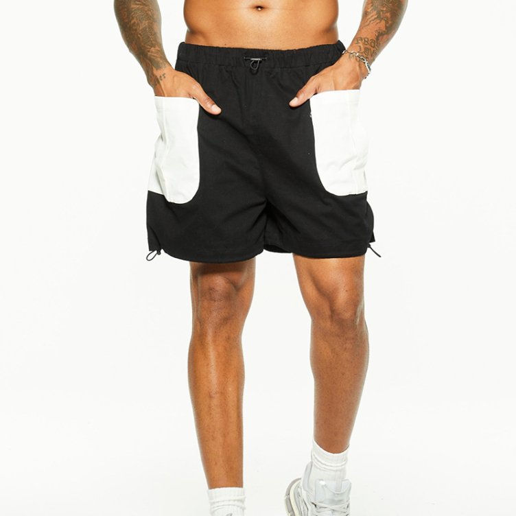 Casual bilateral heterogeneous pocket shorts