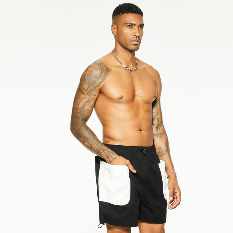 Casual bilateral heterogeneous pocket shorts
