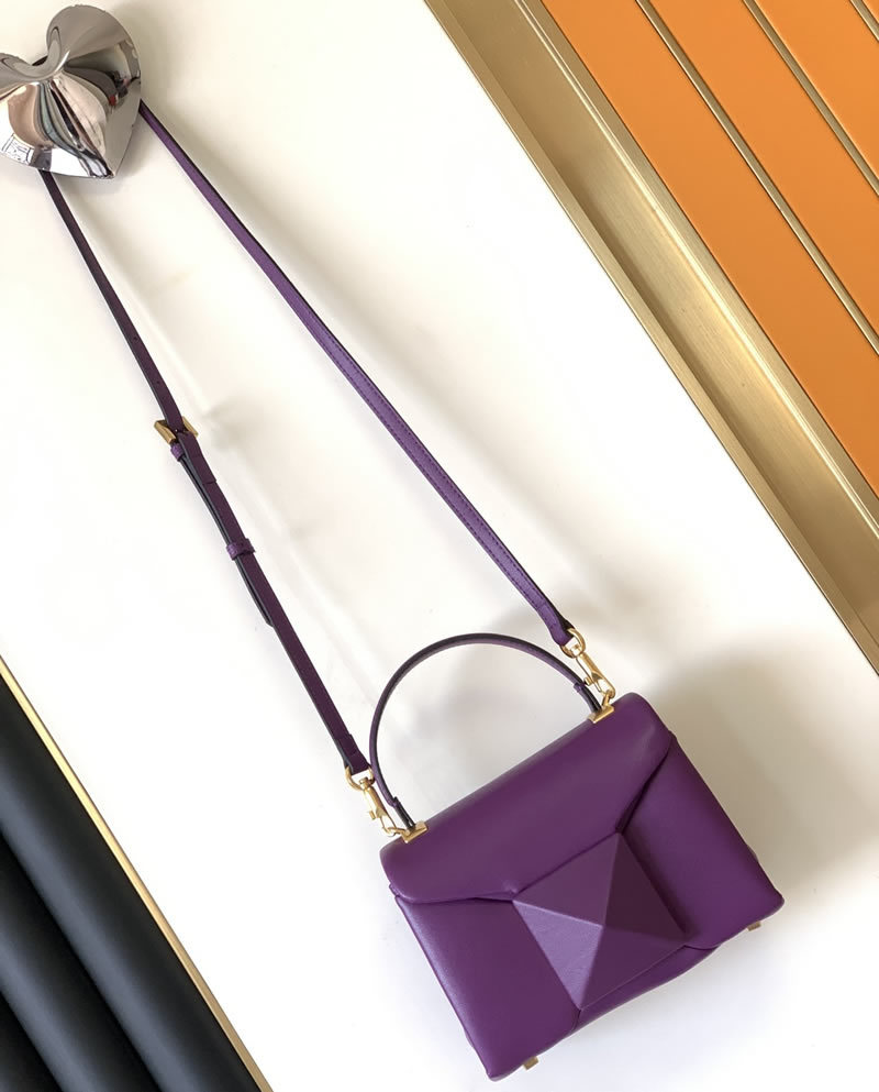 Women's mini sheepskin handbag, large prepuke rivet open and close bag, adjustable multi-purpose shoulder and back and crossbody bag