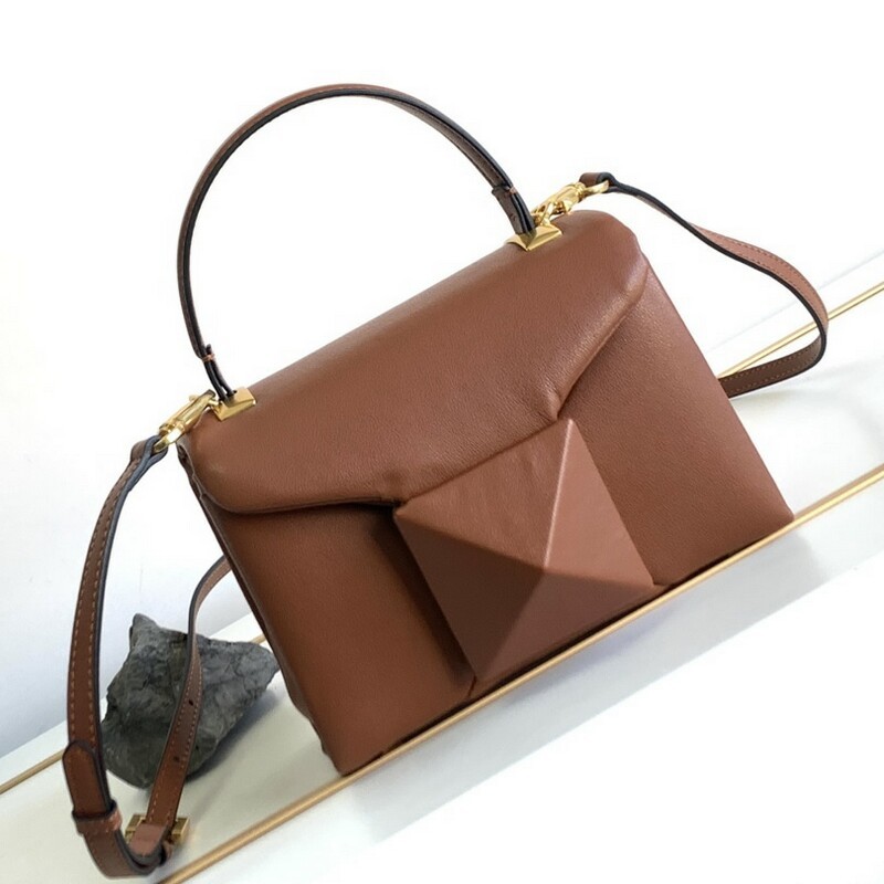 Women's mini sheepskin handbag, large prepuke rivet open and close bag, adjustable multi-purpose shoulder and back and crossbody bag